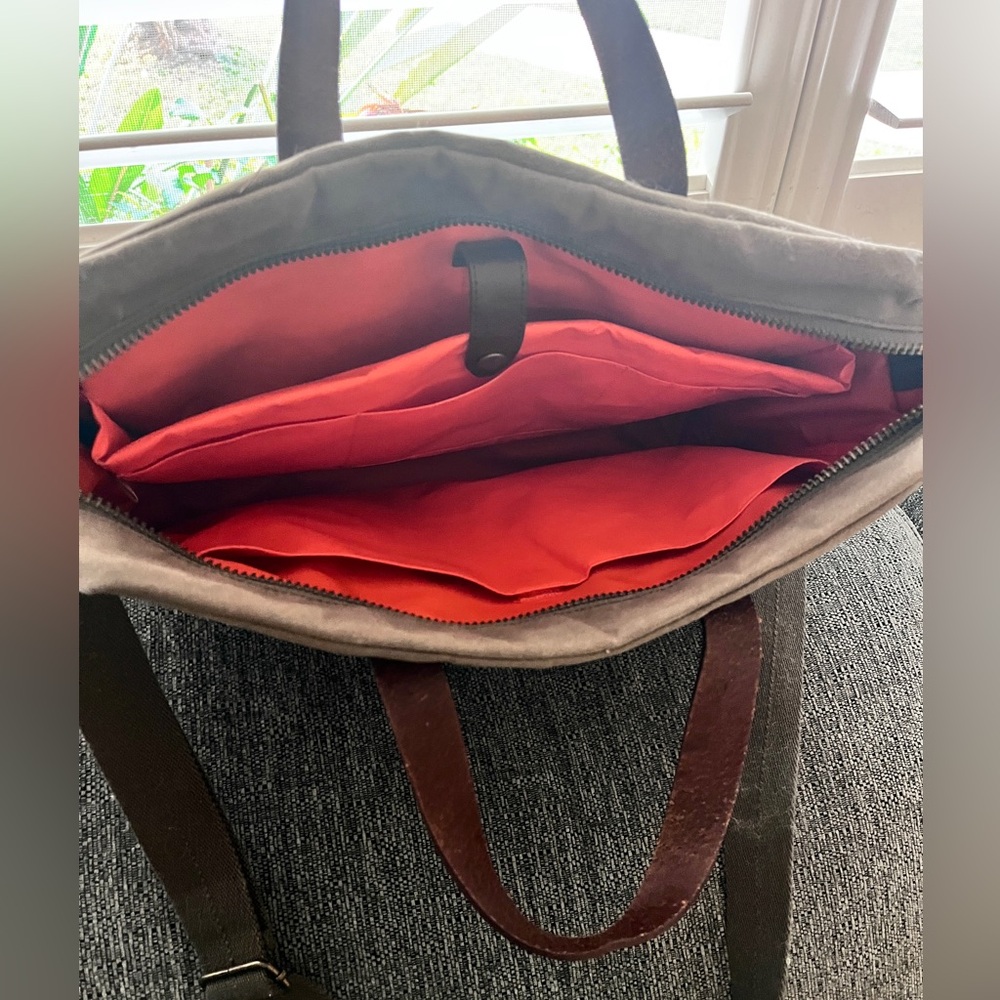 Mark and Graham messenger bag/briefcase.
Waxed canvas with leather trim.